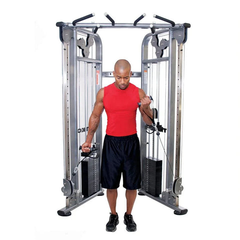 TKO Functional Trainer Cable Machine - Man working out using cable machine