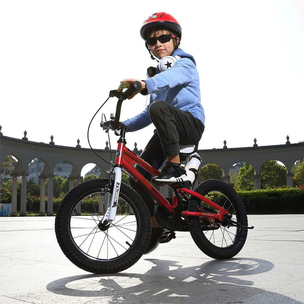 a child on a red bike