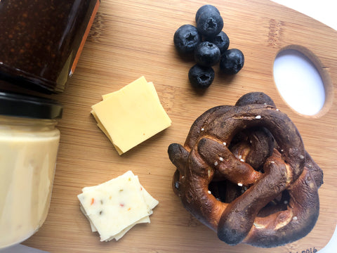 Health Snack Featuring Pretzel, Blueberries, And Cheese