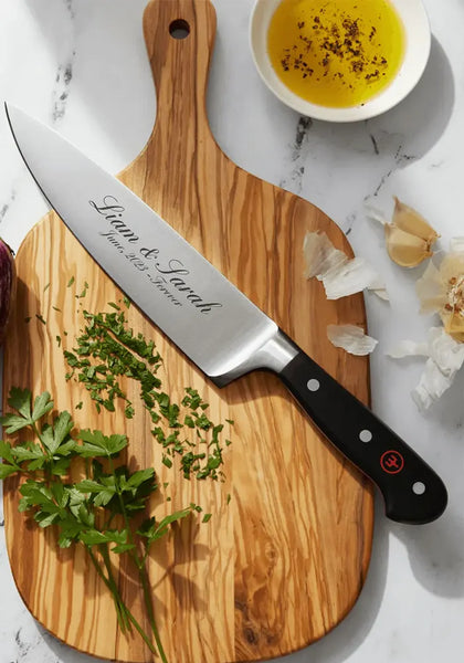 A wedding personalised chef knife, engraved specially with vows