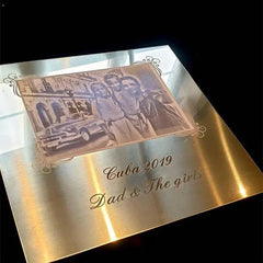 Engraved brass plaque featuing family