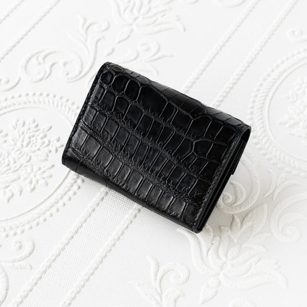 クロコダイルのフラップタイプミニ財布背面
