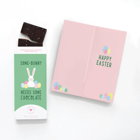"some-bunny needs some chocolate" card with a bunny surrounded by easter eggs on it. Chocolate bar inside.