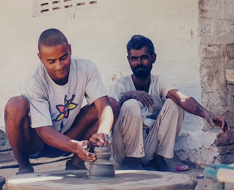 Carl tries his hand at traditional pottery making in India