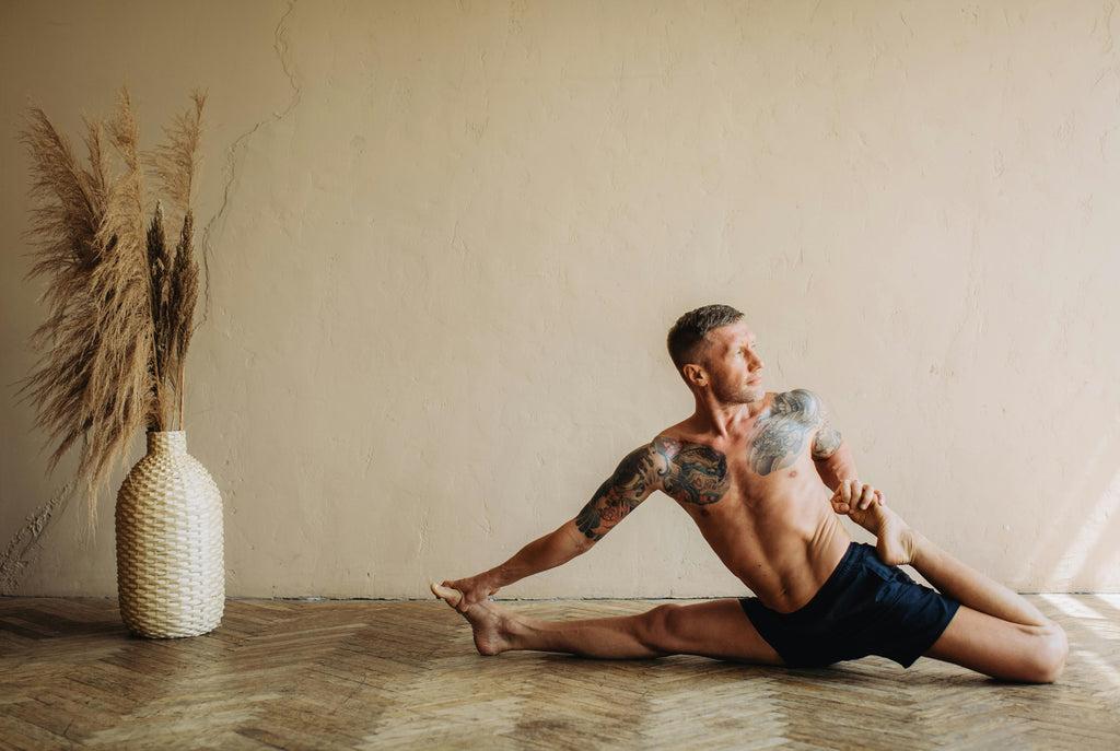 Man With Tattoos Stretching