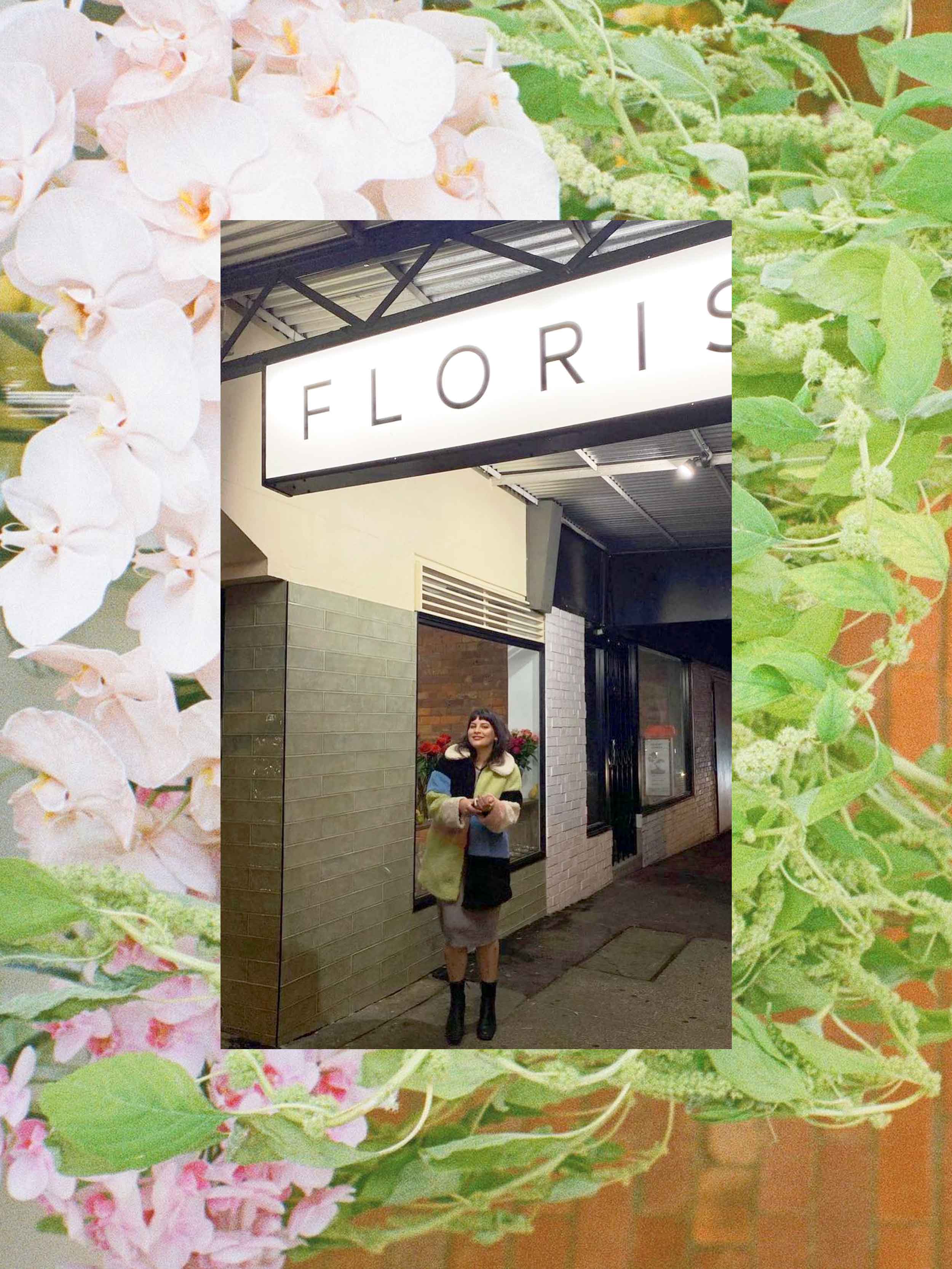 pictured is the florist of Avalon Florals Dehlia Nelms under the front signage of her shop