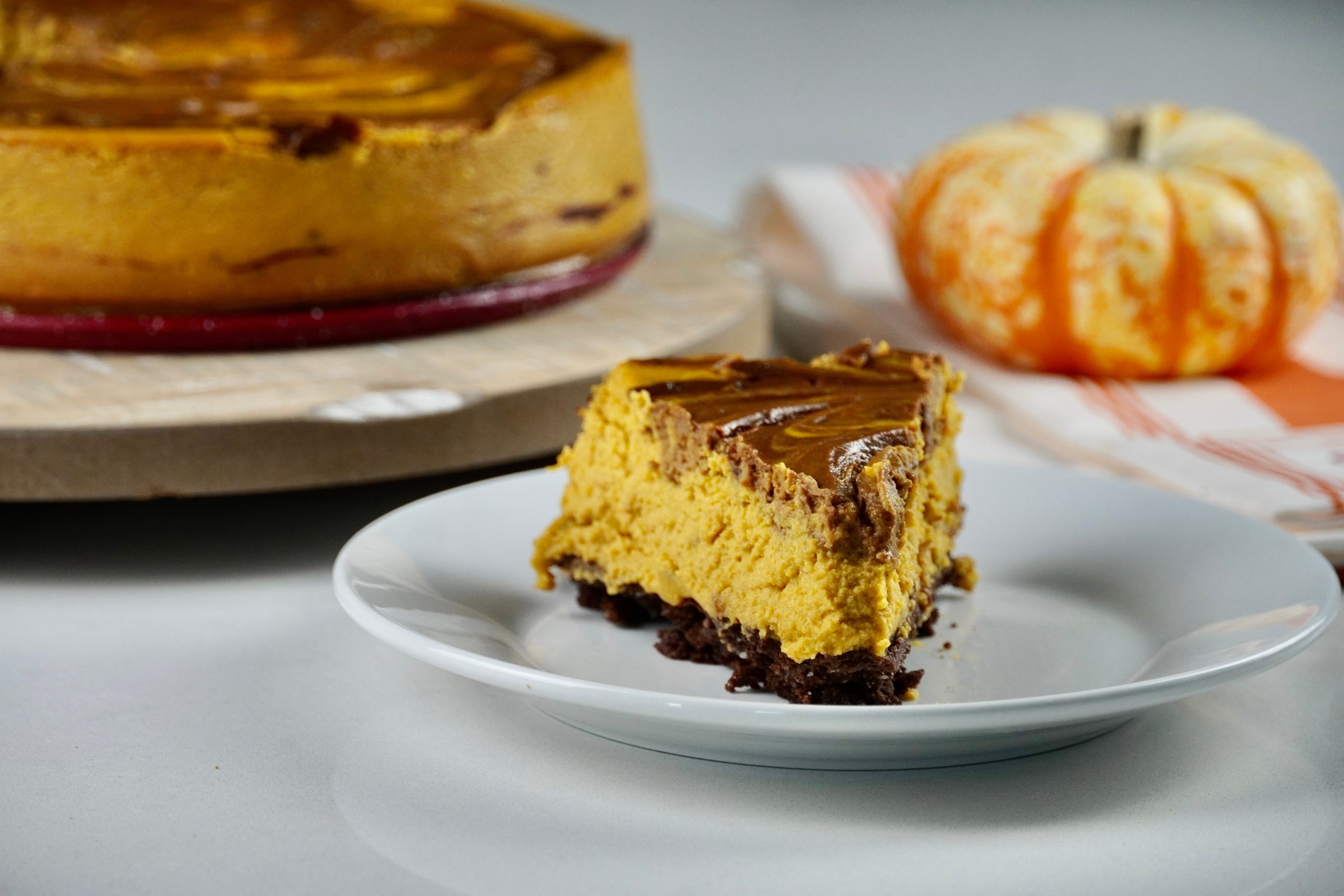 Keto Pumpkin Chocolate Swirl Cheesecake