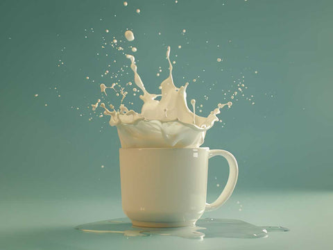 top shot , epic milk dynamic shot from a falling goofy mug