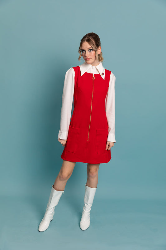 Closet Mod red pinafore mini dress with patch pockets and gold ring zip. Princess line seams and square neckline.