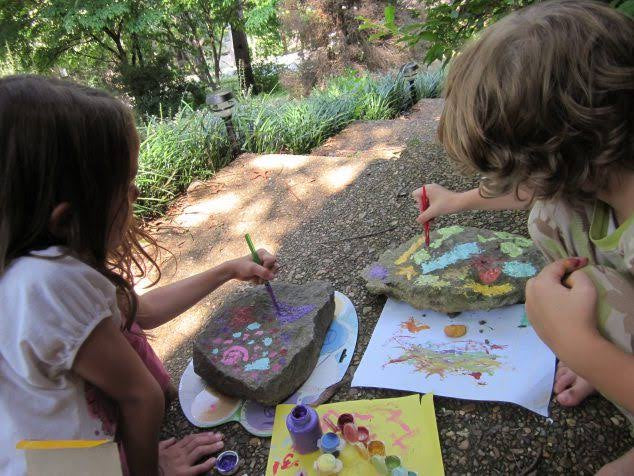 Kids doing rock painting.