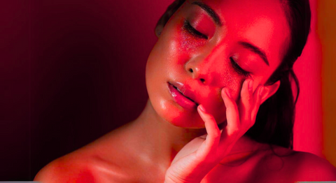 Girl Using Red Light Therapy For Younger Skin And Appearance