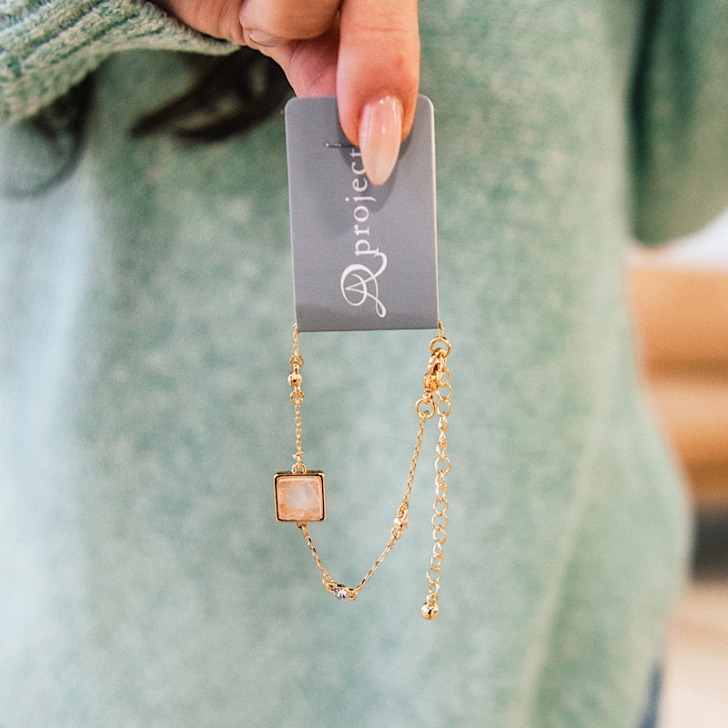 Gold Bracelet with Peach Square Charm