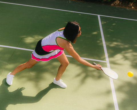 Woman in Workout Gear on Pickleball Court