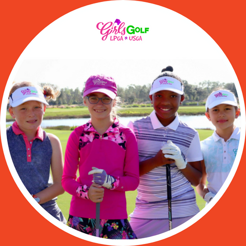 Four smiling golfers for Girls Golf in colorful sportswear for LPGA* USGA tournament.