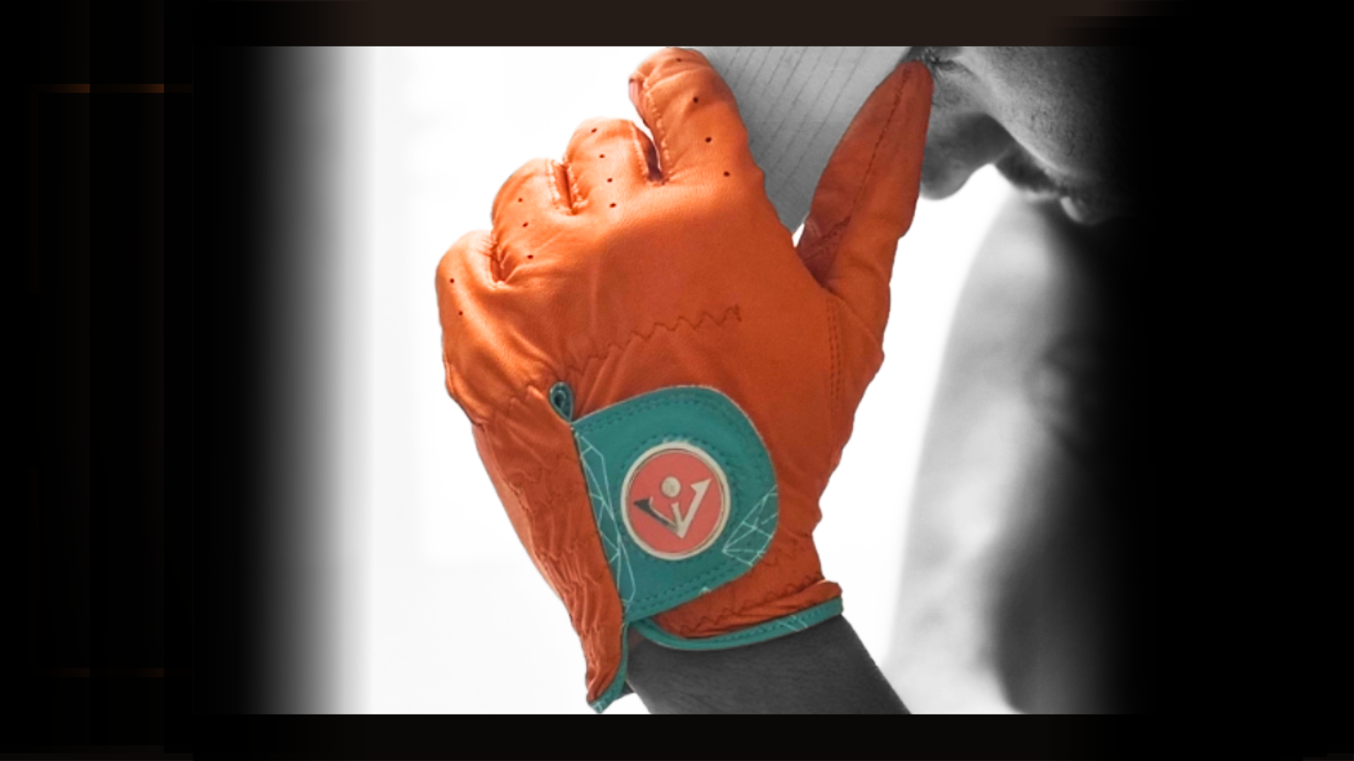 VivanTee colorful golf glove in vibrant orange and tiffany blue.  