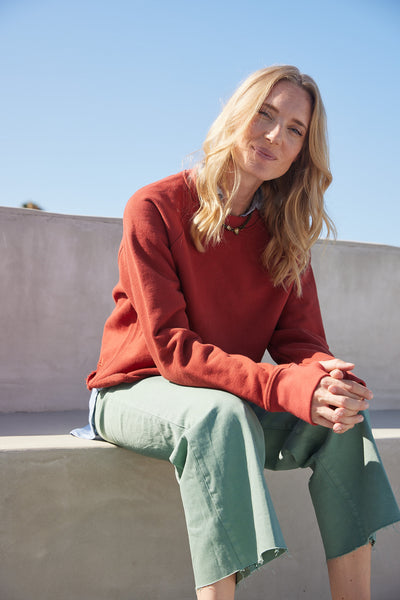 With raglan sleeves & stitching that narrows out the shoulders, and a raw hem for some added style, it looks flattering and fantastic on all body types.   Make it your own - whether you layer underneath or show some midriff, this staple crewneck is ready to go. Featuring our heavy-weight 100% cotton 17 oz French Terry and of course, thumbholes.   Wear it to the beach, the gym, your cabin in the mountains, at home for a cozy night in, or out for brunch - it was made to do it all.
