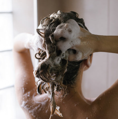 Woman washing her hair