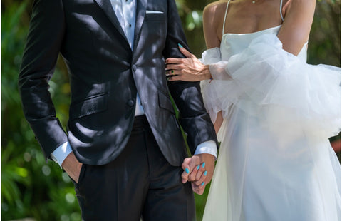 Custom tuxedo and custom ruffled shawl and skirt wedding dress in Dallas Texas by Margo West