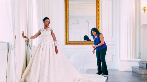 Iconic Margo West beautiful dress maker couture expert and a gorgeous model in a custom made wedding gown.