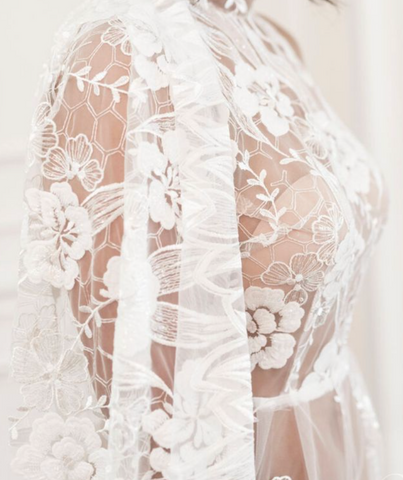 Illusion neckline and lace wedding gown, sexy wedding dress on a beautiful bride