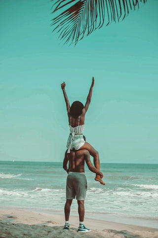 A beautiful couple having a dream honeymoon at the beach