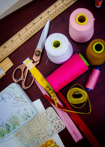 Sewing materials in bright colors for a custom wedding dress