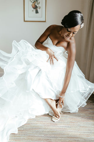 Beautiful Black woman bride getting ready.