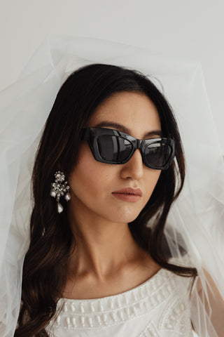 Bride in sunglasses being glamours
