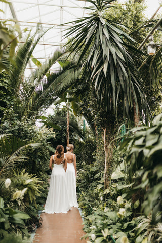 Sleek silk wedding gowns on beautiful brides in the tropical jungle. Chic styles of wedding gowns.