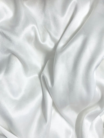 satin fabric for custom made wedding gown by Margo West.