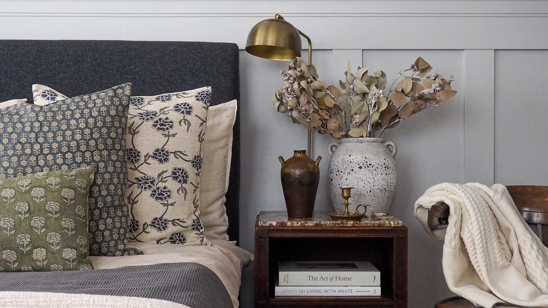 Cushions arranged on bed