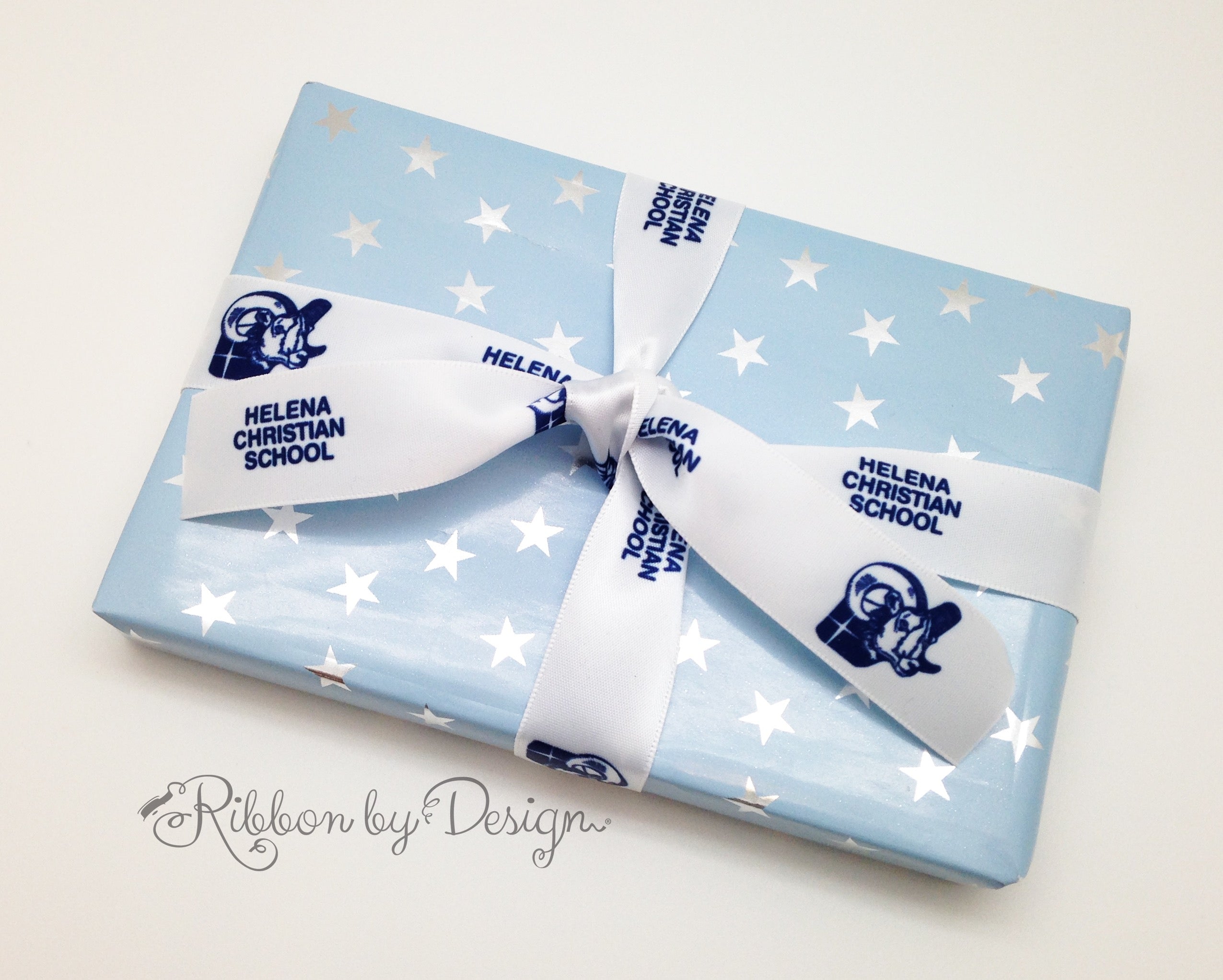 Helena Christian School's custom ribbon with the school logo on it