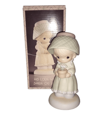 Precious Moments Figurine By Enesco.  His Love Will Shine On You Figurine Featuring A Woman Holding A Flower Pot With Flowers.