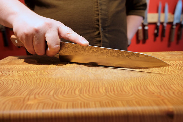 What You Should Do With Your Cutting Board Before Using A Knife