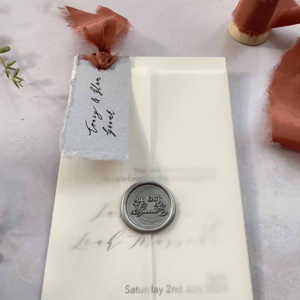 pretty diy wedding invitation with a vellum wrap, wax seal and silk ribbon.  How to make easy wedding invitations at home