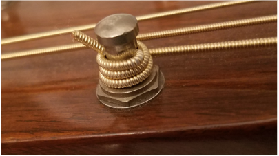 How to Change your Acoustic Guitar Strings Wound Peg