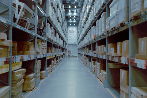a warehouse with fluorescent lights