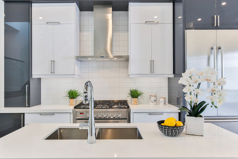 grey and white kitchen with extractor fan