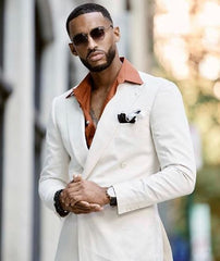 Black man in white suit