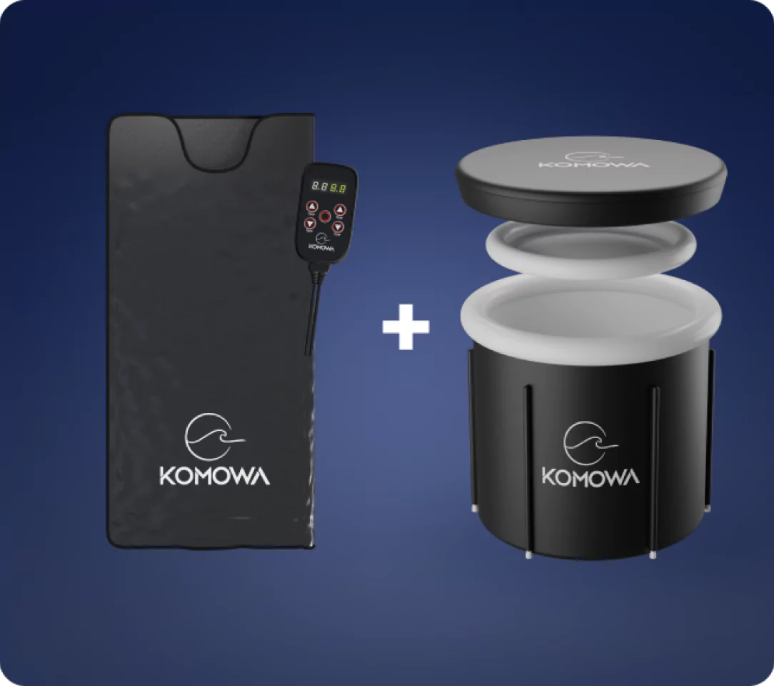 Black Komowa massage device and accessories on a dark blue background.