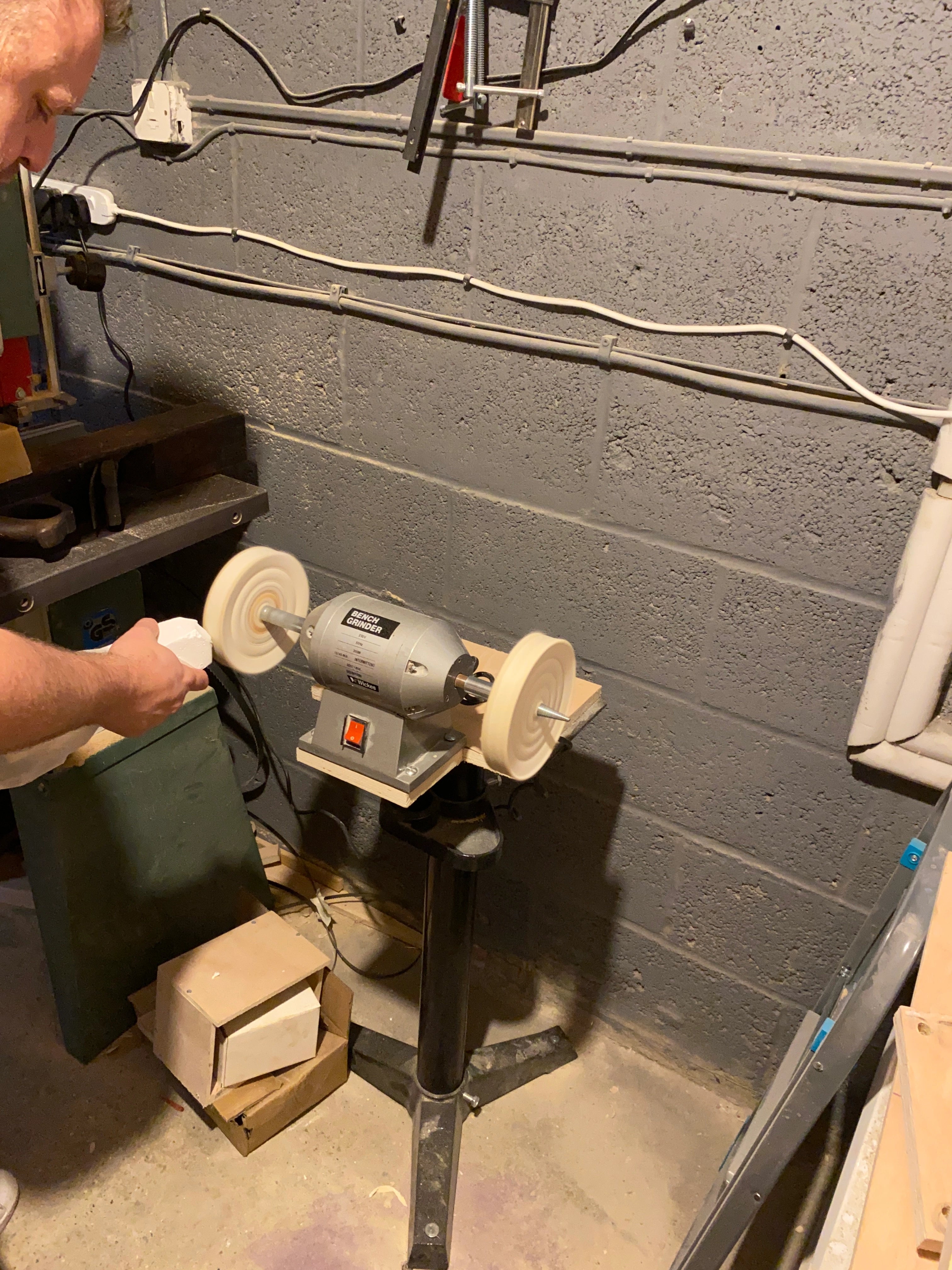 polishing a cricket bat