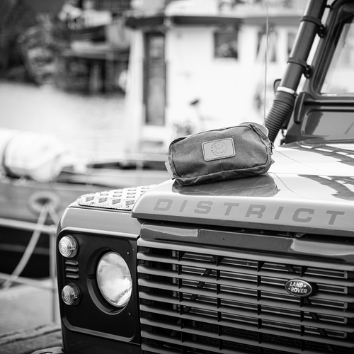 Closehold bag on top of Land Rover Defender bonnet