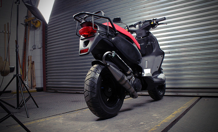 Sport tires and a race exhaust on a Genuine RoughHouse Scooter  