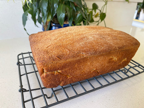 Baked bread cooling on rack