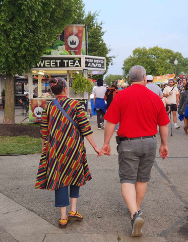 Jim and I walking hand in hand at the Indiana State Fair