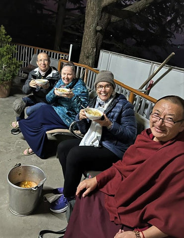 Sangha members enjoying soup in a bucket. Warm, savory, spicy, made from scratch and sponsored by our teacher, Geshe Kunga.