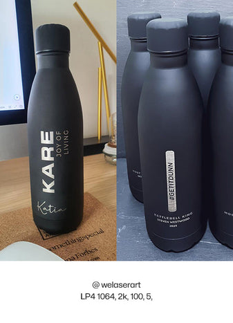 Black drinking bottles with logo engraving, made by welaserart