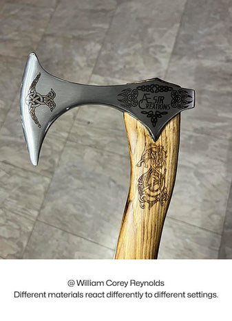 Axe with engraved patterns, made by William Corey Reynolds