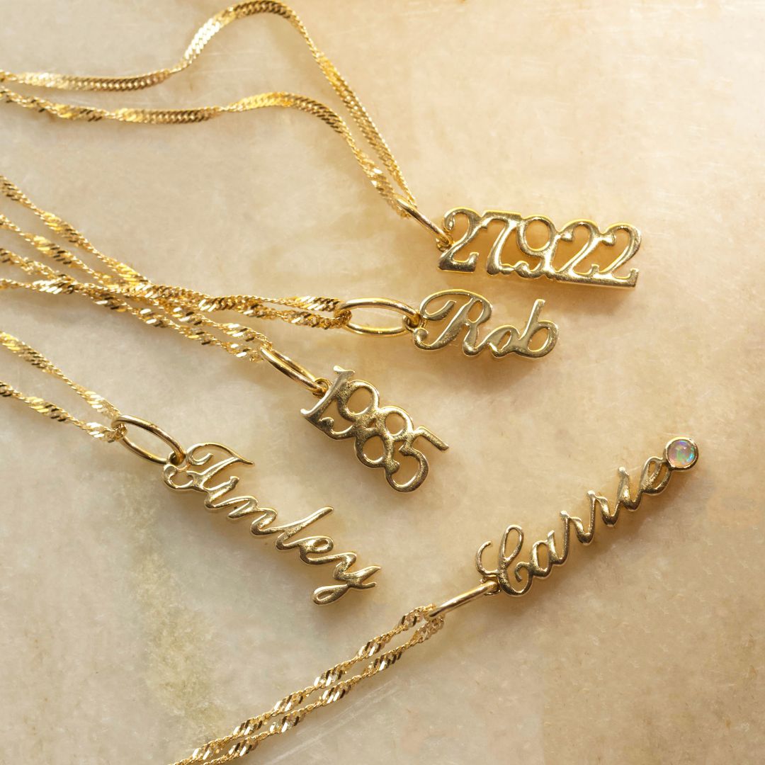 Carrie Elizabeth Treasured collection solid gold charms .jpg__PID:5210e2f2-abaa-4a64-a456-4355efd78efb