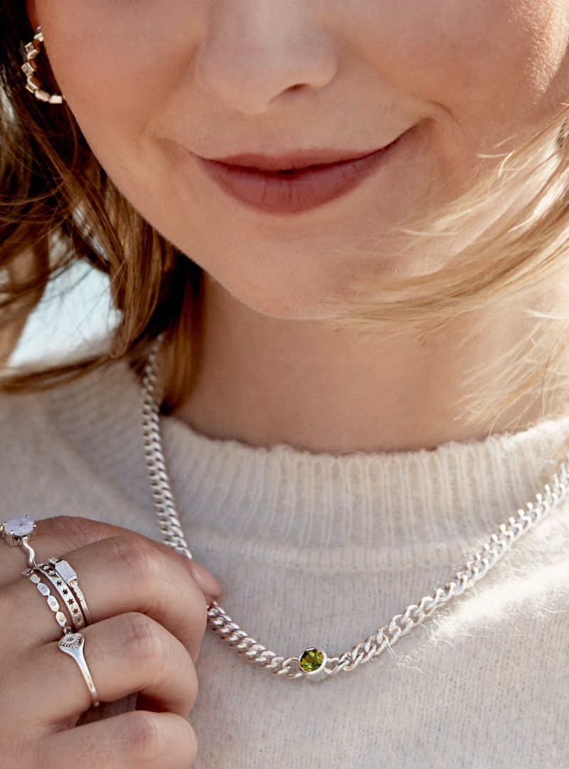 Zoe Sugg wears the My Universe Peridot Curb Chain in Silver Plating